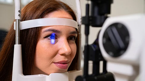 Woman getting her eye checked.