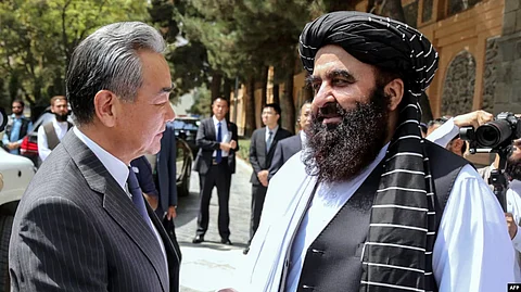 Taliban Foreign Minister Amir Khan Muttaqi welcomes Chinese Foreign Minister Wang Yi to Kabul ahead of an August 20 trilateral meeting with Pakistan.