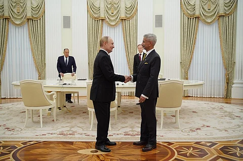 S Jaishankar shaking hands with Vladimir Putin