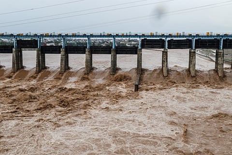 Tawi River flows in spate following heavy rainfall in Jammu on Sunday, Aug 24, 2025.