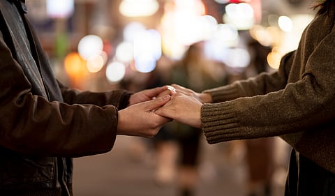 couple holding hands