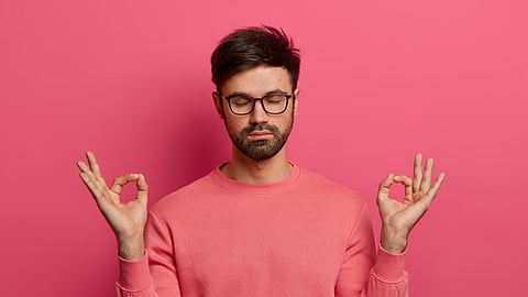 Men meditating