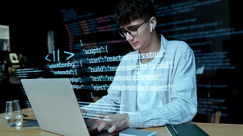 Guy doing coding.