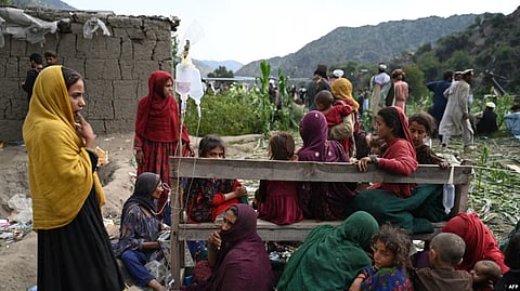 Injured Afghan women and girls sit as they receive medical treatment following an earthquake in the Mazar Dara village in Kunar province, Afghanistan.