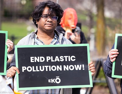 Activists stage a protest outside global plastics treaty talks.