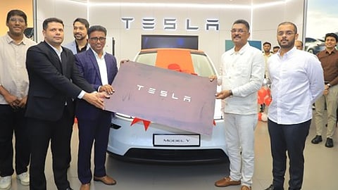 Maharashtra transport minister becomes first Tesla Model Y owner in India, vows to raise awareness about EVs