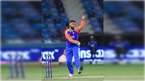 Dubai: India’s Varun Chakaravarthy bowls a delivery during the Asia Cup 2025 match between India and United Arab Emirates at Dubai International Cricket Stadium, in Dubai, Wednesday, September 10, 2025.