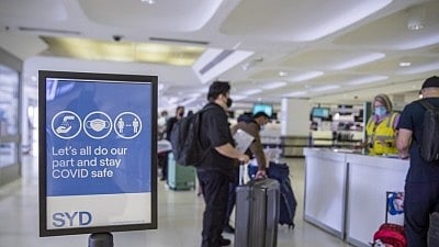 Passengers line up for COVID-19 check at Sydney Airport in Sydney, Australia, on Nov. 1, 2021.