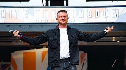 Tommy Robinson on stage at the 'Unite the Kingdom' march