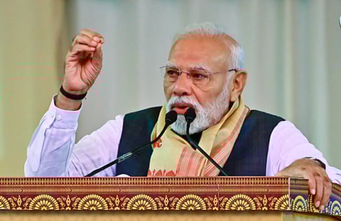 Darrang: Prime Minister Narendra Modi addresses the audience during the laying of foundation stones and inauguration of multiple development works at a public programme in Darrang, Assam on Sunday, September 14, 2025.