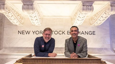 In the image, On the right is Sirini Gopal posing for the camera with a smile on his face.