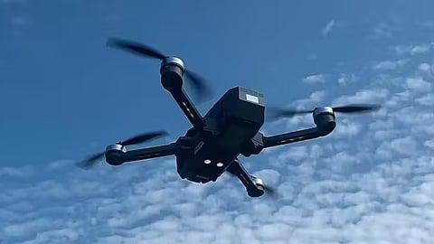 A quadcopter drone is seen flying in this August 2, 2020 photo.