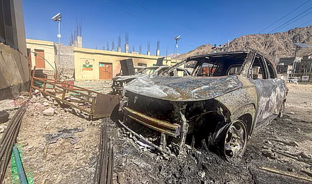 Leh: Burnt and damaged vehicles lie outside the BJP office following violent protests over statehood demand, in Leh, Thursday, September 25, 2025.