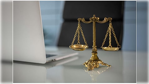 A golden weighing balance