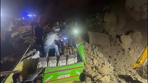 Image of bus which got buried under a landslide in Bilaspur, Himachal Pradesh.