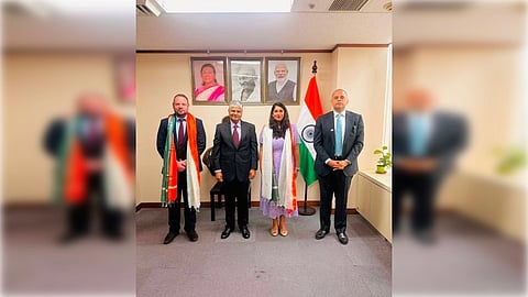 India's Ambassador to China Pradeep Kumar Rawat and India's Consul General of India in Shanghai, Pratik Mathur, felicitate Bhavya Mehta