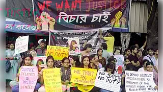 Kolkata: Junior Doctors of the R G Kar Medical College and Hospital hold placards as they stage a protest against the alleged sexual assault and murder of a woman postgraduate trainee doctor, in Kolkata on Sunday, August 10, 2024.