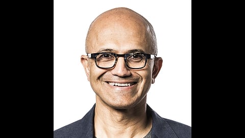 Satya Nadella smiling towards