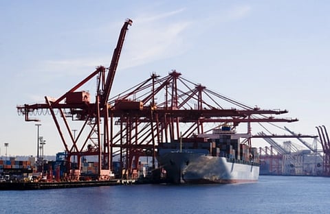 Image of Adani Mundra Port Kutch in Gujarat, where a ship is seen by the coast.