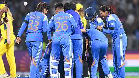 Indian women’s cricket team celebrating their semifinal victory over Australia, with Jemimah Rodrigues and Harmanpreet Kaur at the centre of the celebrations.