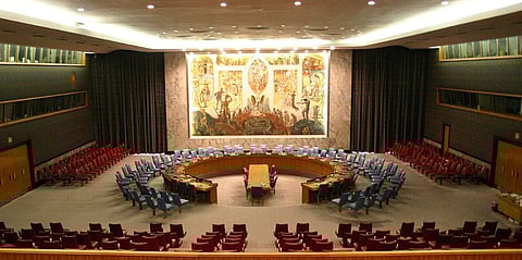 Image of an empty room with chairs and tables of the United Nations Security Council Chamber in New York, also known as the Norwegian Room