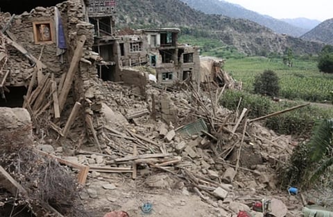 Image of a building destroyed in an earthquake in Afghanistan. The image depicts the destruction caused by the 6.3 earthquake in Afghanistan.