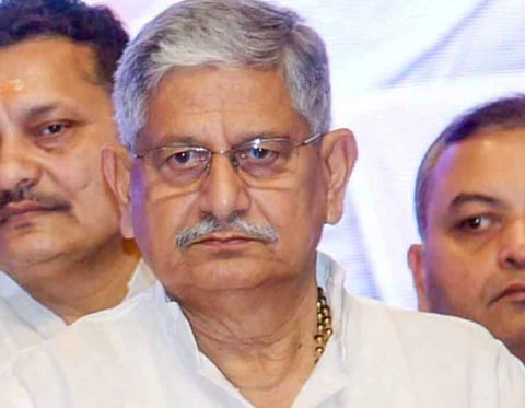 Image of Union Minister Rajiv Ranjan alias Lalan Singh in a white kurta and spectacles. A FIR has been registered against Lalan Singh.