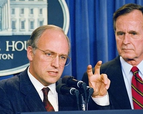 Image of former US VP Dick Cheney giving a speech along with George W Bush beside him