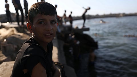 Children Playing by the Water in Gaza