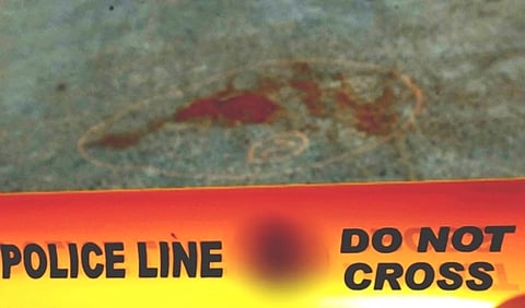 In the image Do not cross, Police Line is shown in a yellow red colour strip