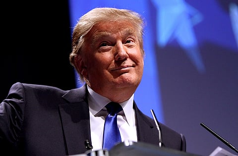 Image of Trump smirking while speaking at CPAC in Washington D.C. on February 10, 2011.