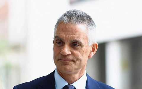 Image of former director general of BBC Tim Davie who has given his resignation. In the image he is looking towards right in his royal blue suit.