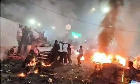 In the image bomb blast is shown in Red for region which cars on fire.