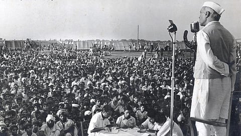 In the image Jawaharlal Nehru is shown addressing a very big audience