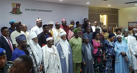 A group of religious leaders standing together during a conference by the Nigeria Inter Religious Council.