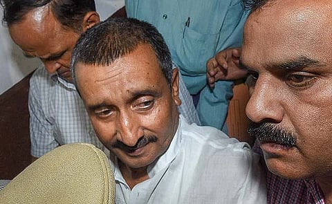 A close-up shot of Kuldeep Singh Sengar while in custody.