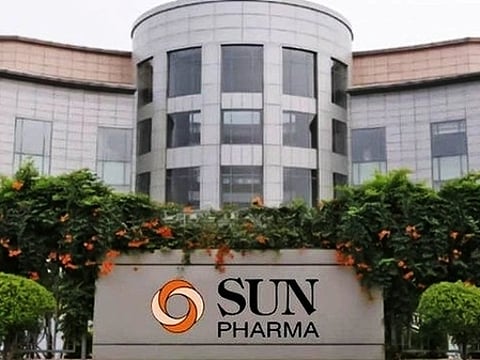 Main building of a Sun Pharma office, with board bearing the company name in front.