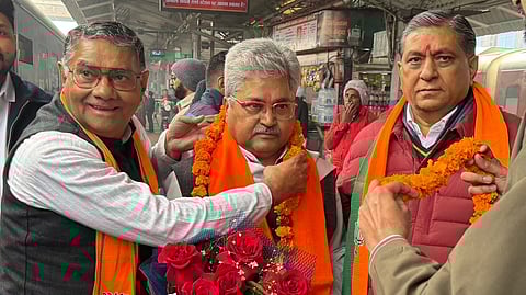 Dushyant Kumar Gautam being garlanded BJP politicians at a railway station in Punjab.
