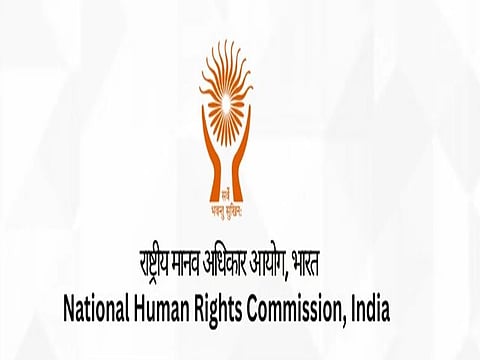 The image is a logo of the NHRC.