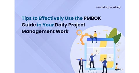 Illustration of diverse professionals interacting with a large calendar, representing project management. Text reads: 'Tips to Effectively Use the PMBOK Guide in Your Daily Project Management Work.' The tone is professional and instructional.