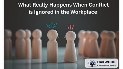 Wooden figures with symbols of anger face each other amidst a group. Text reads "What Really Happens When Conflict is Ignored in the Workplace."