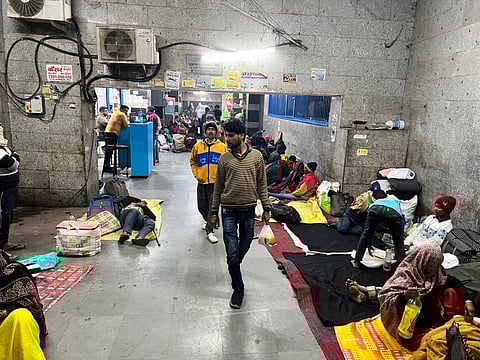 Patients lying on the ground inside AIIMS subway