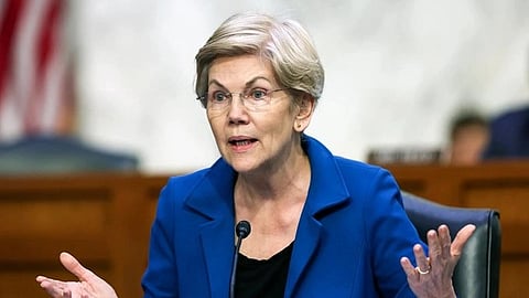 In the image Elizabeth Warren is shown speaking to an audience
