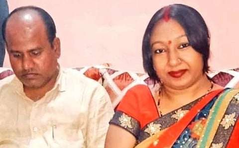Image of UP couple who were sentenced to death for sexually assaulting children. The man is looking downward while the woman is looking towards the camera