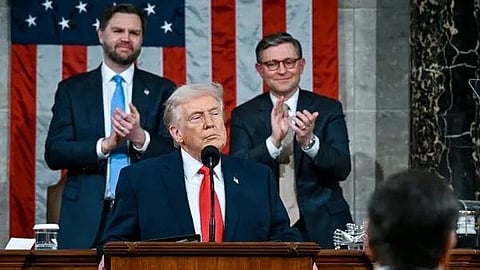 In the image Trump is shown adressing the audience behind him are vice presidents of United States