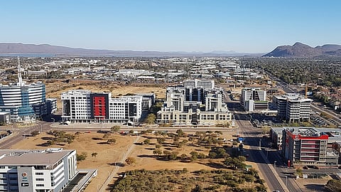 View from the top of the I-Tower (restaurant) southwards. Gaborone Dam (left) and Kgale Hill (right) in the background.
