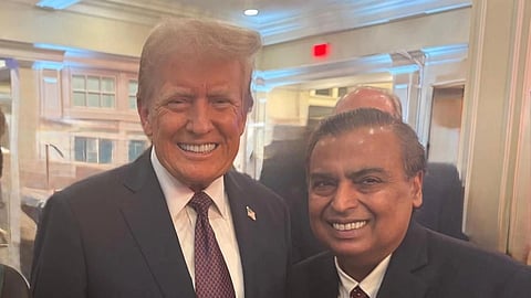 Donald Trump and Mukesh Ambani standing together smiling