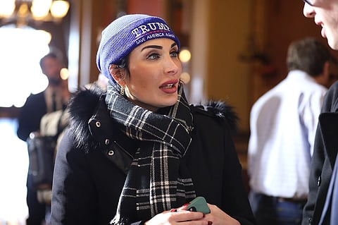 Laura Loomer speaking with attendees at a "No Eminent Domain! No Carbon Pipelines!" rally at the Iowa State Capitol in Des Moines, Iowa.