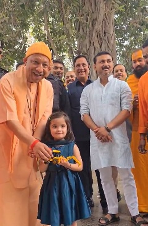 A toy bulldozer and a big smile: Little girl’s sweet gesture delights UP CM Yogi