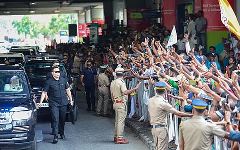 Kerala assembly election 2026: Image of PM Modi waving a crowd in Kerala. in the image Prime Minister Narendra Modi is visiting Kochi, Kerala in March 2026 to launch the National Democratic Alliance's campaign for the state's upcoming legislative assembly election.